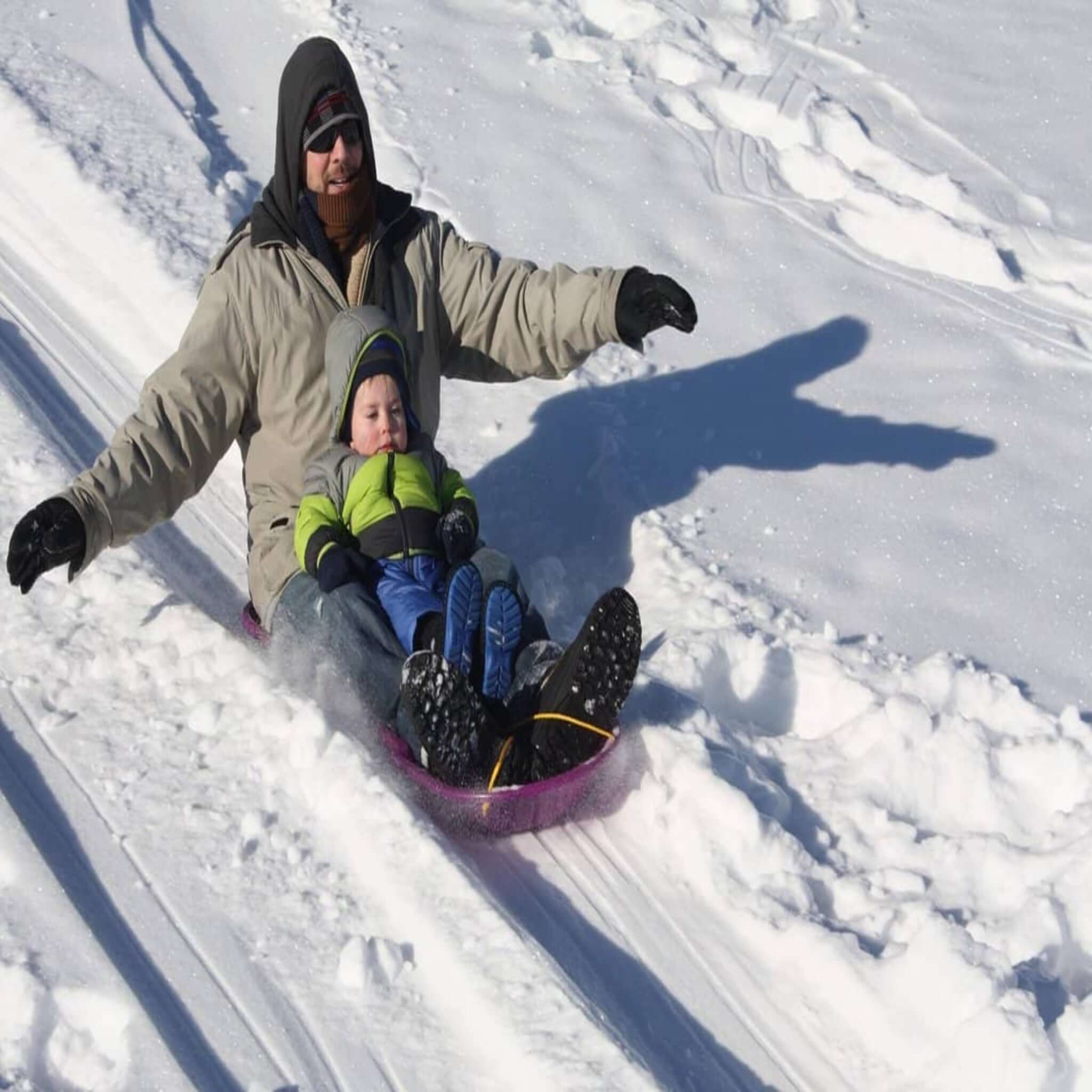 Burnout recovery -man and child sleigh 